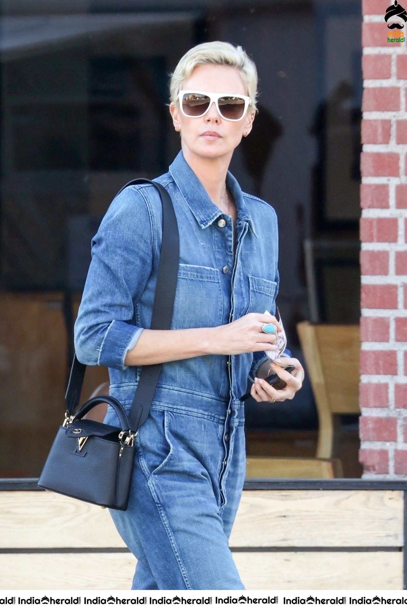 Charlize Theron caught by Paparazzi as she was seen Out in Los Angeles