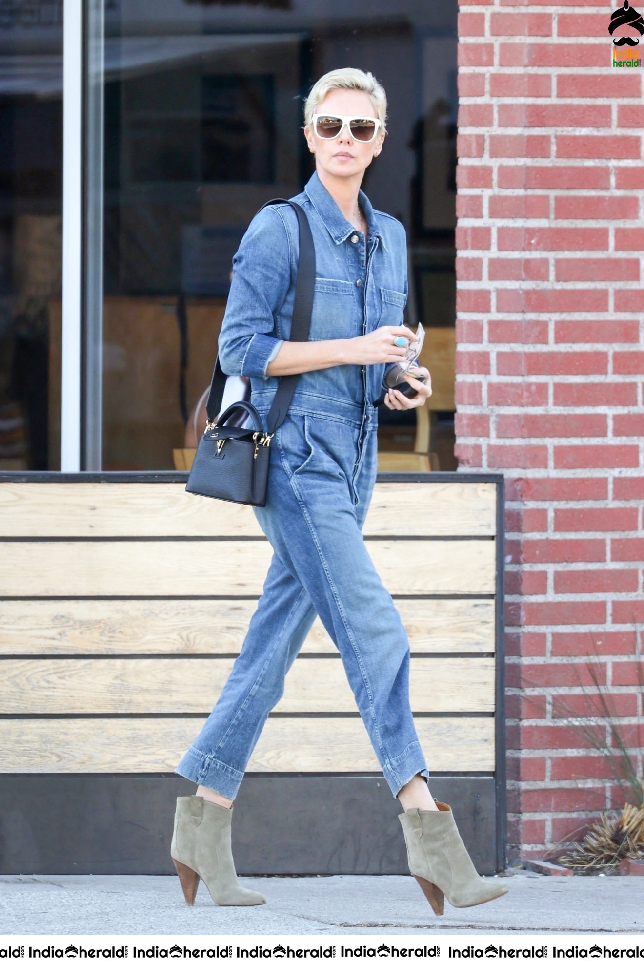 Charlize Theron caught by Paparazzi as she was seen Out in Los Angeles