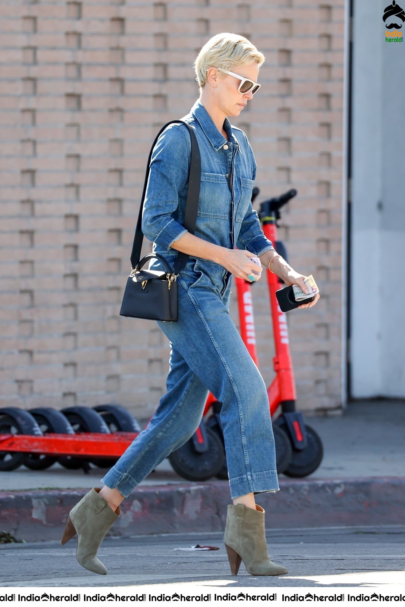 Charlize Theron caught by Paparazzi as she was seen Out in Los Angeles