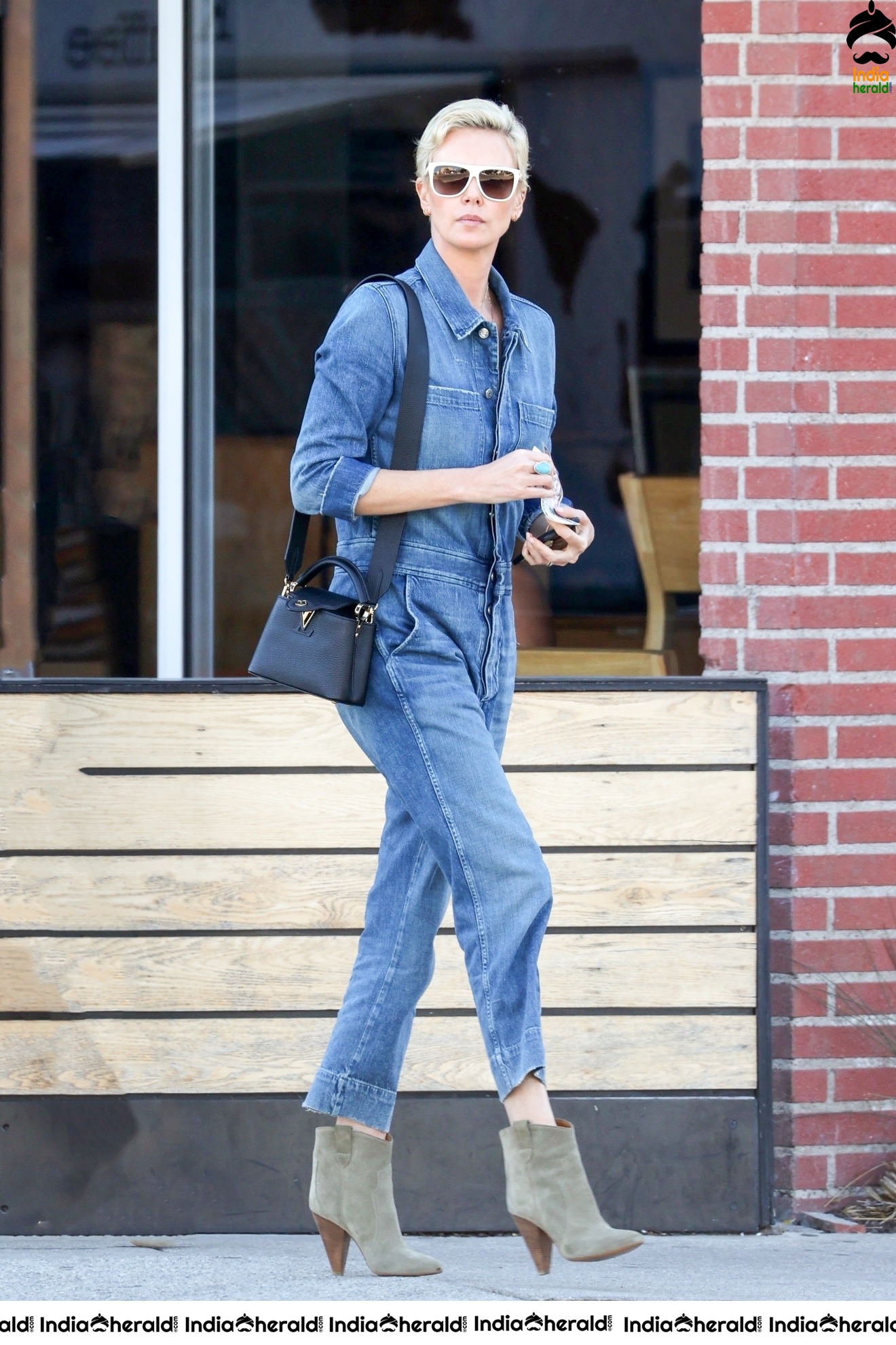 Charlize Theron caught by Paparazzi as she was seen Out in Los Angeles