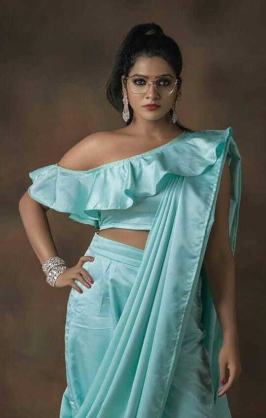 Chitra Seduces In A Sky Blue Satin Dress