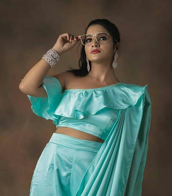 Chitra Seduces In A Sky Blue Satin Dress