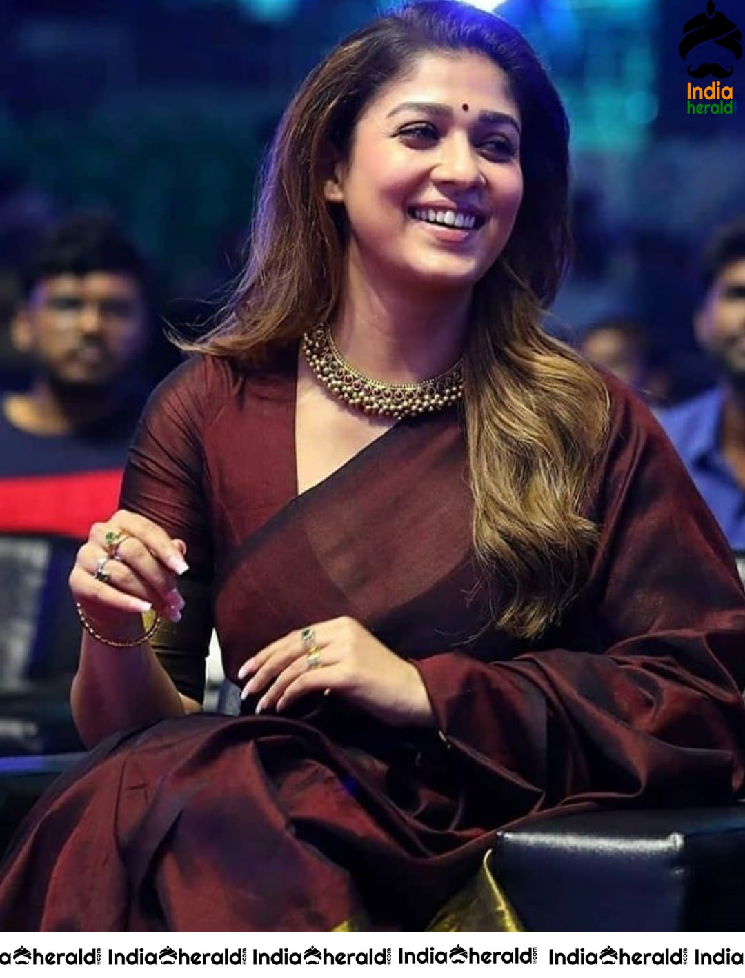 Cute Nayanthara Expressions in Brown Saree