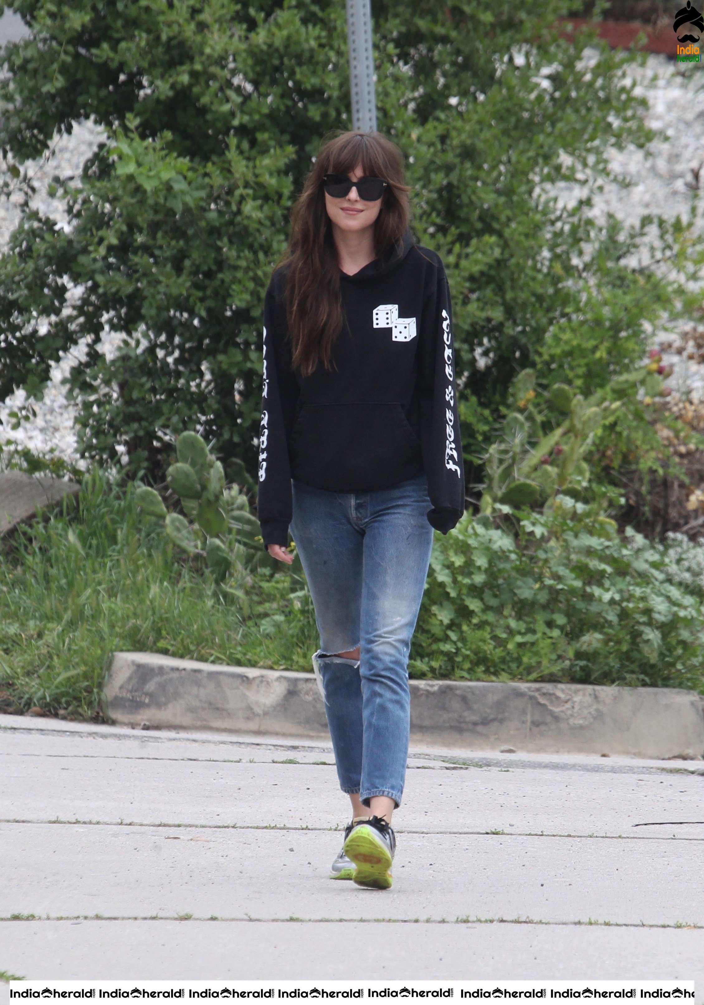 Dakota Johnson caught by Paparazzi as she takes a walk during lockdown in Los Angeles