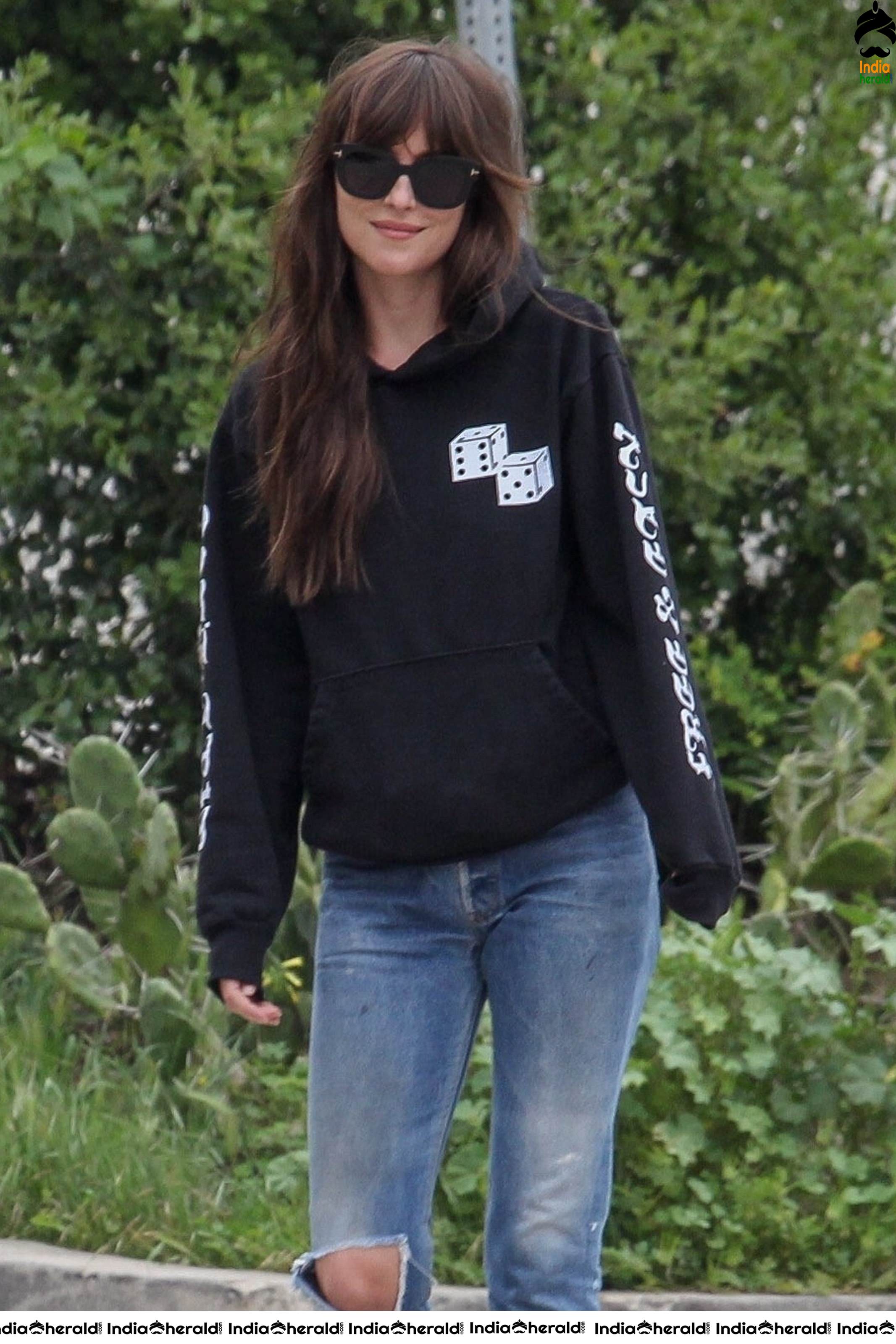 Dakota Johnson caught by Paparazzi as she takes a walk during lockdown in Los Angeles