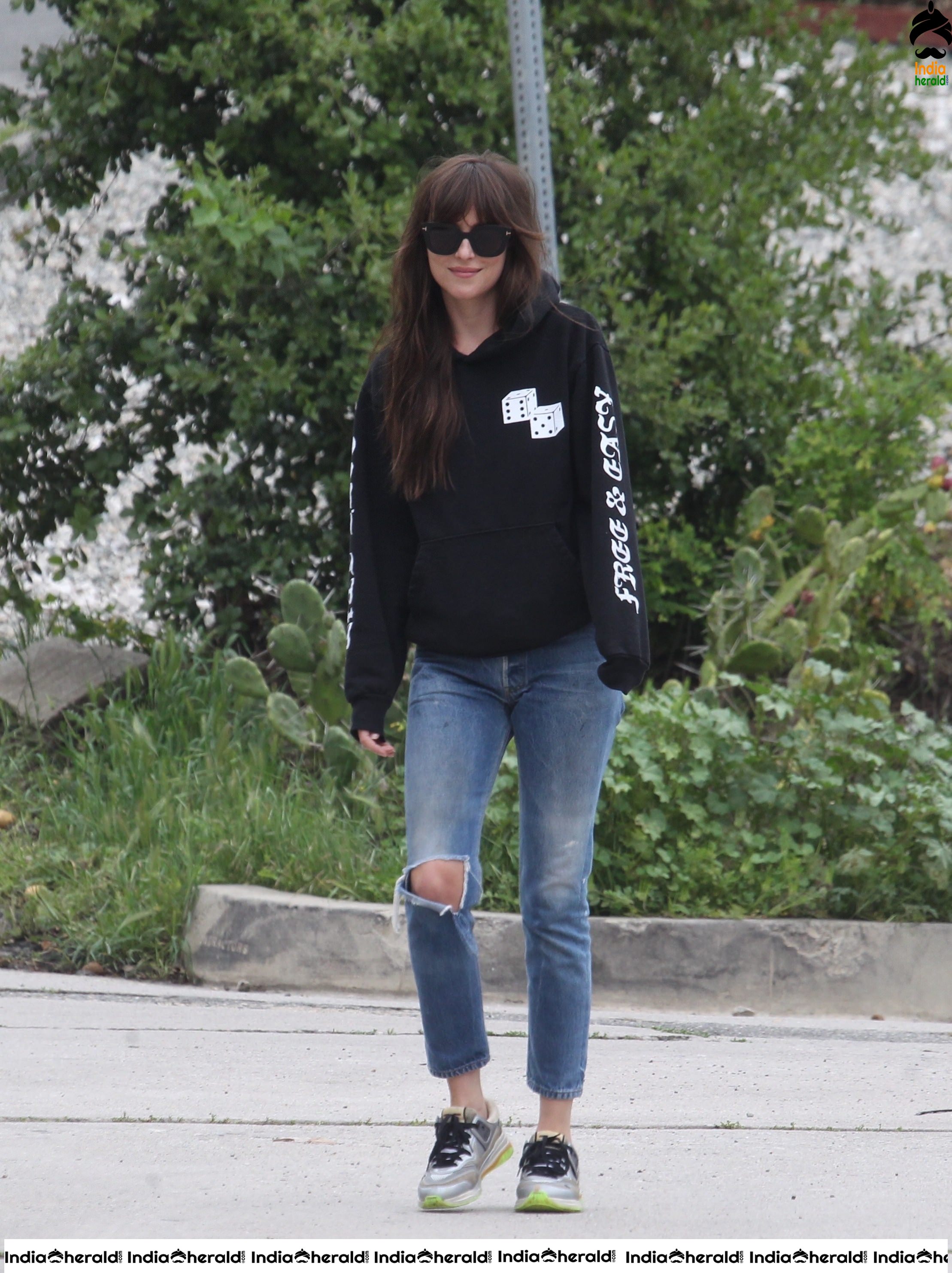 Dakota Johnson caught by Paparazzi as she takes a walk during lockdown in Los Angeles