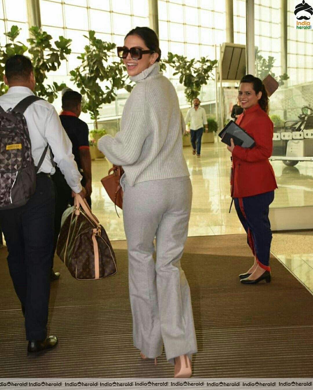 Deepika in her Winter outfit at Mumbai Airport