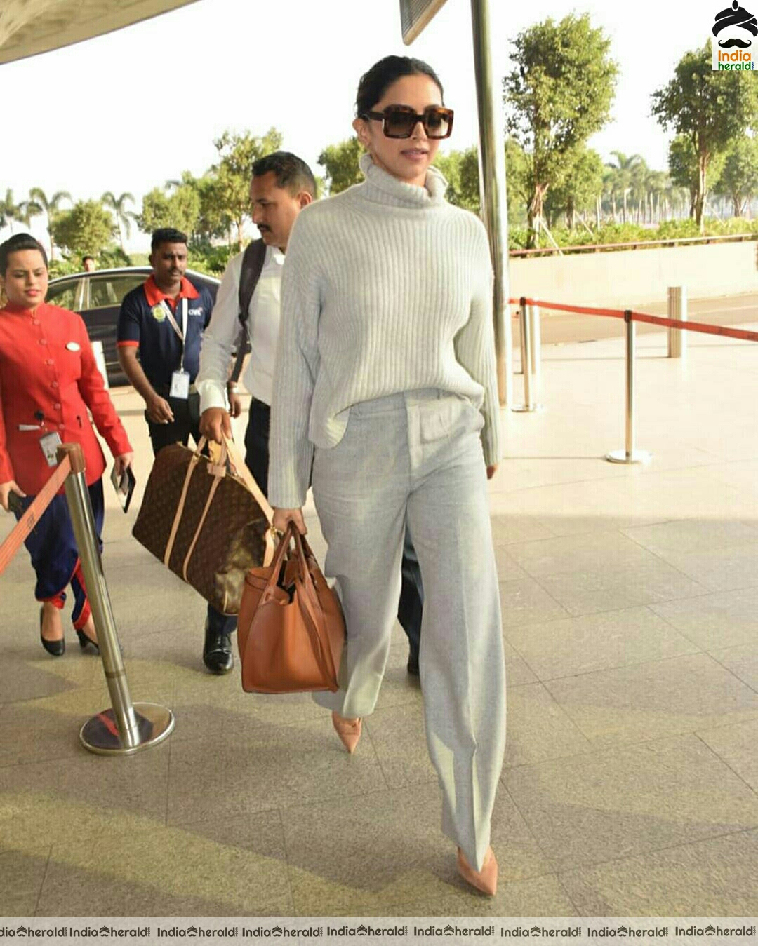 Deepika in her Winter outfit at Mumbai Airport