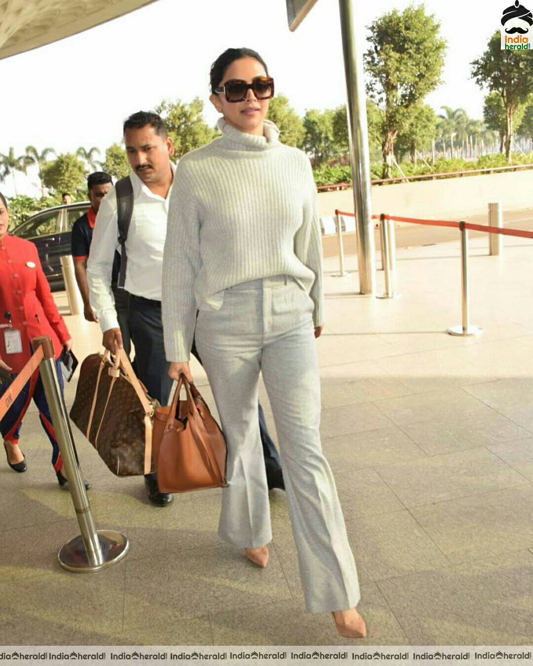 Deepika in her Winter outfit at Mumbai Airport