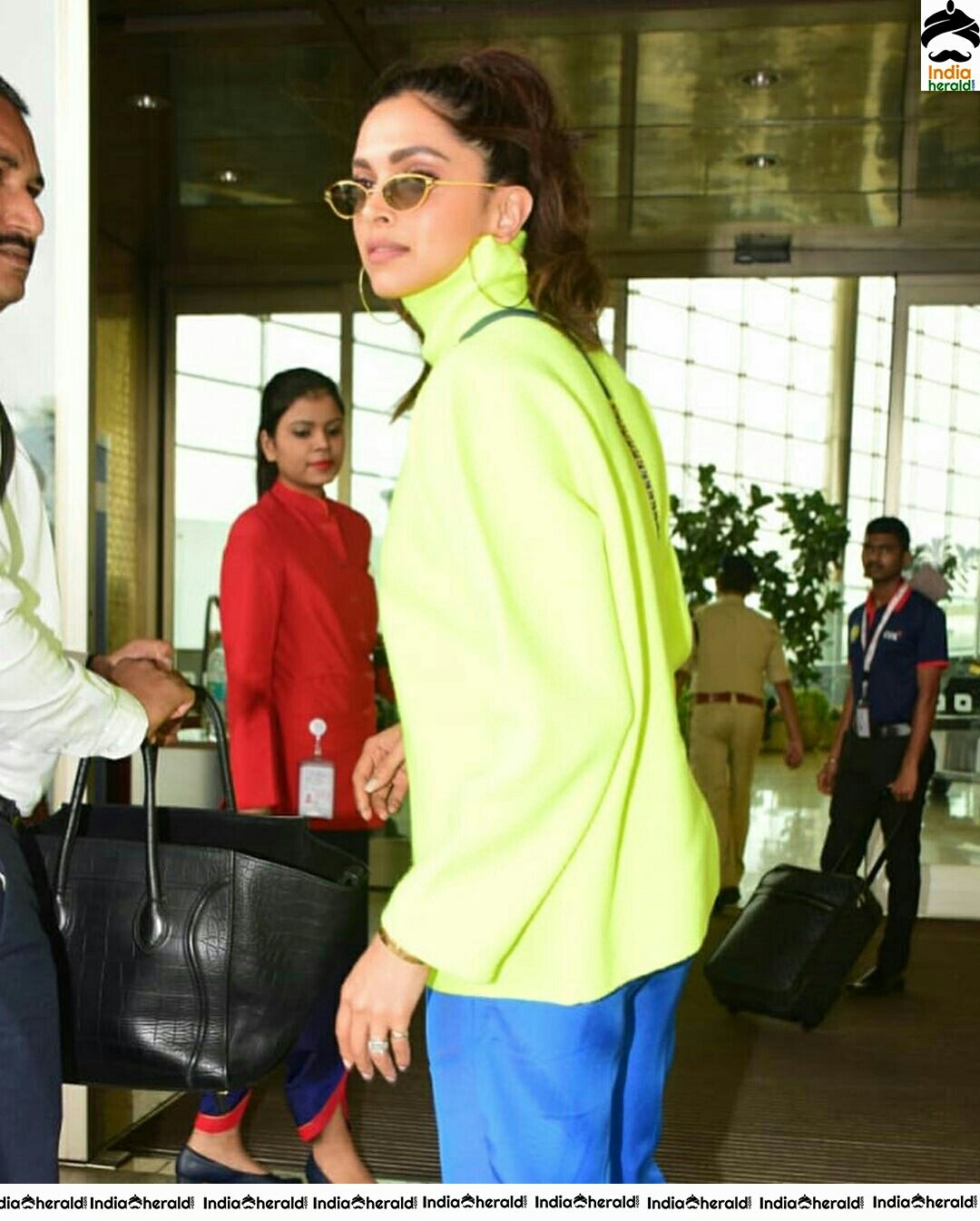 Deepika Padukone Borrows Ranveer Singh Neon Turtle Neck T Shirt For Her Latest Outing Set 1