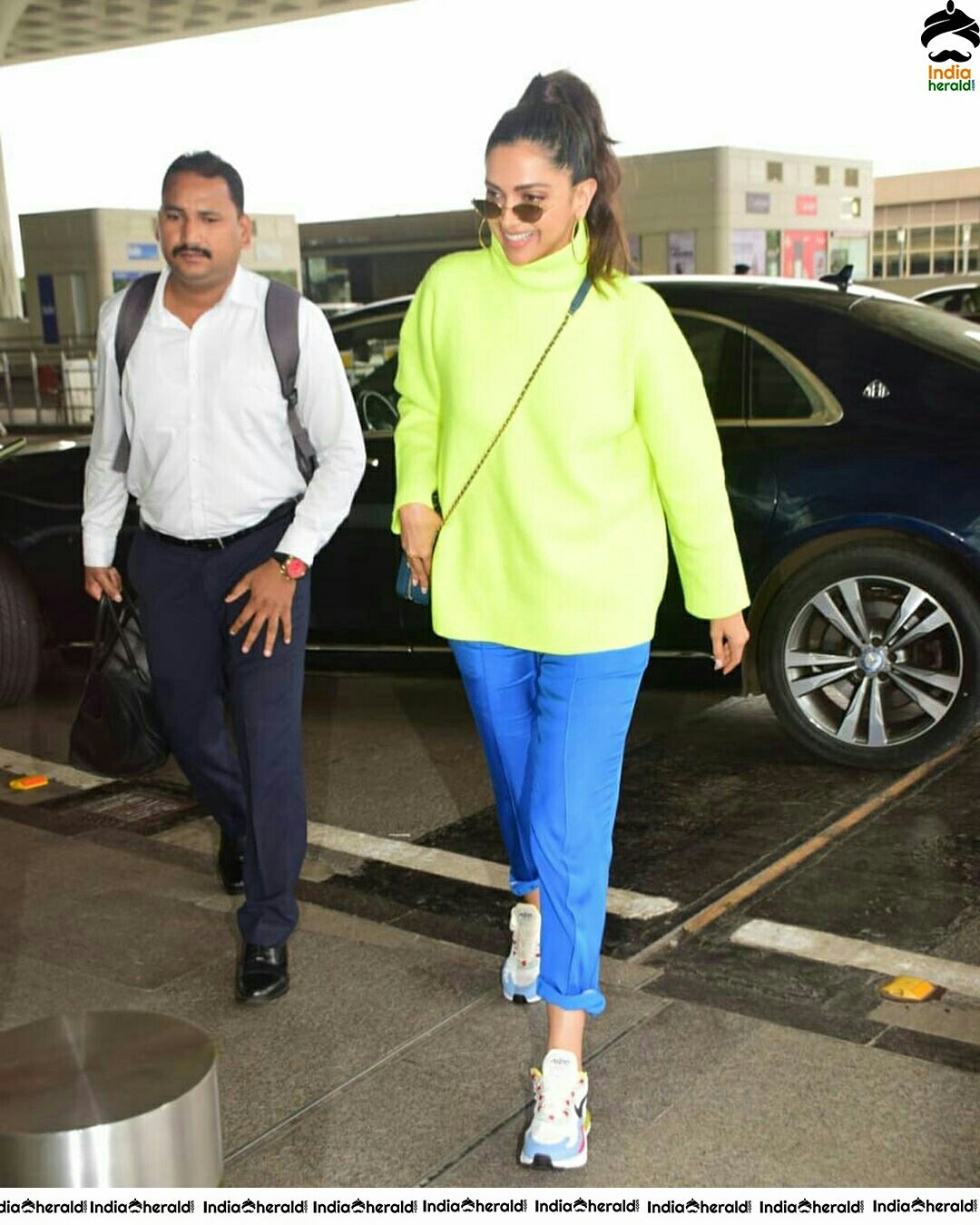 Deepika Padukone Borrows Ranveer Singh Neon Turtle Neck T Shirt For Her Latest Outing Set 1