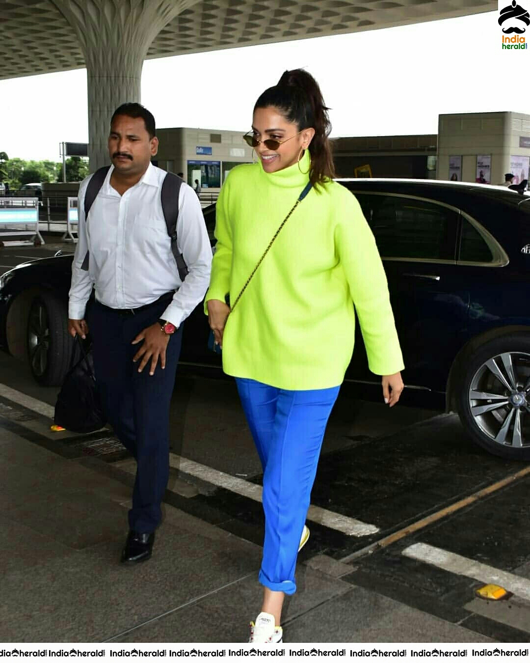 Deepika Padukone Borrows Ranveer Singh Neon Turtle Neck T Shirt For Her Latest Outing Set 2