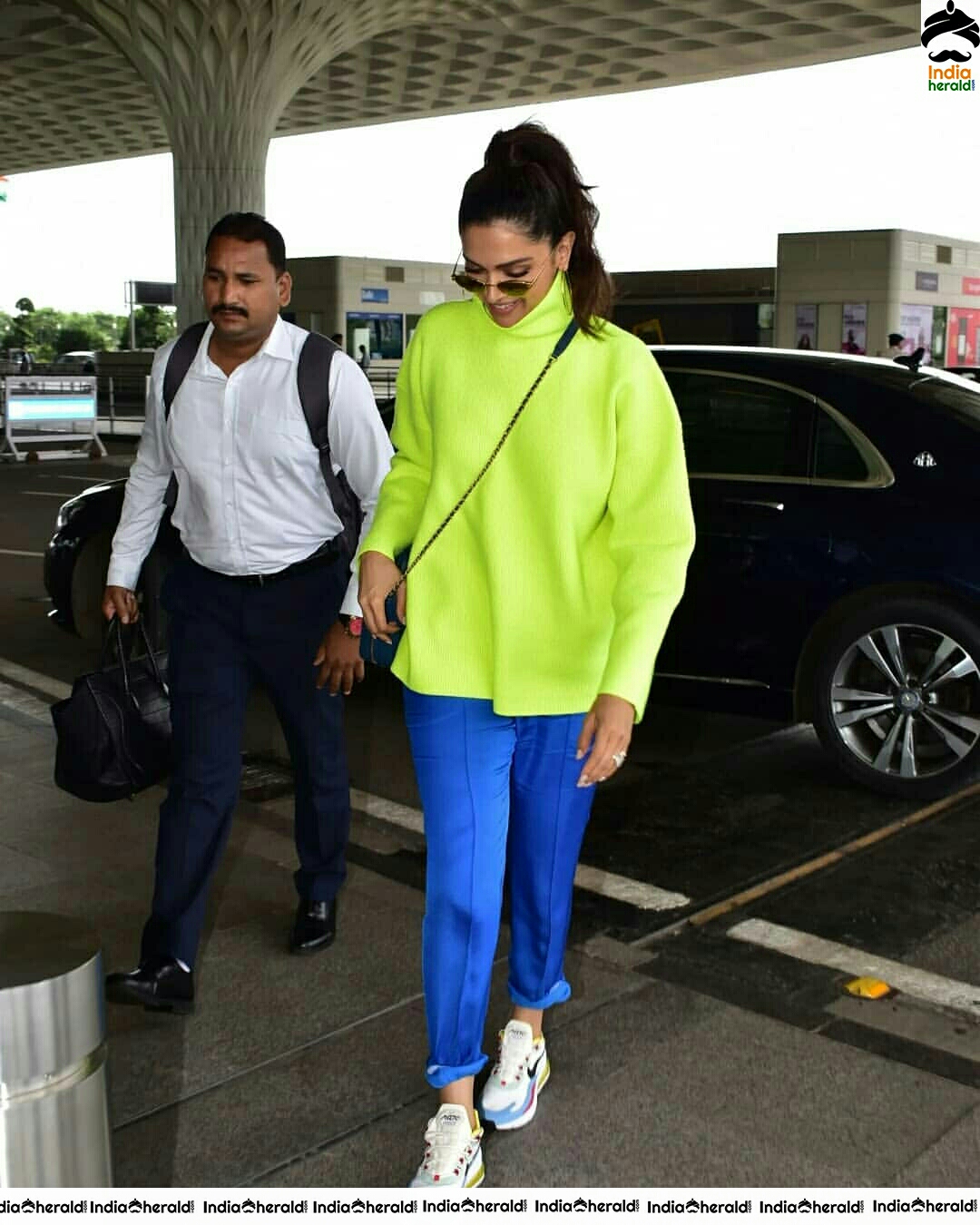 Deepika Padukone Borrows Ranveer Singh Neon Turtle Neck T Shirt For Her Latest Outing Set 2