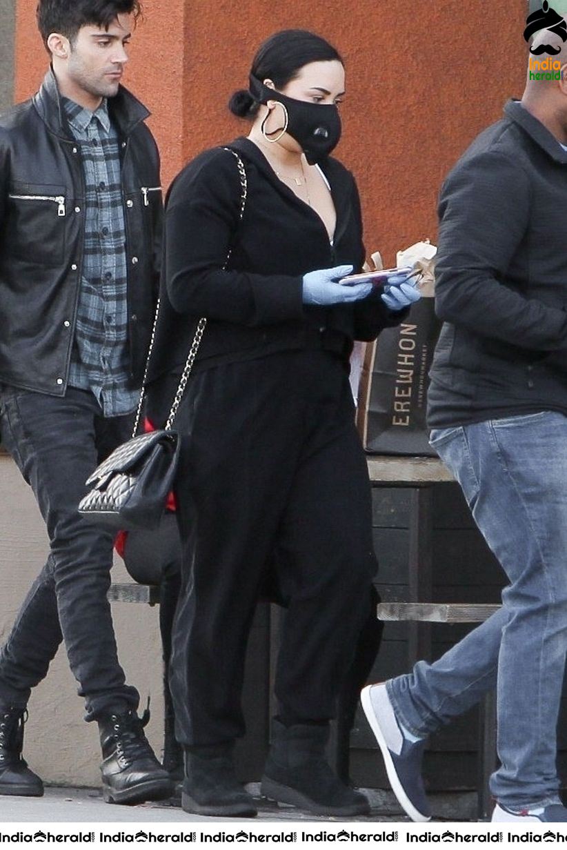 Demi Lovato Wears a Corona Virus mask as she shops at Erewhon in Los Angeles