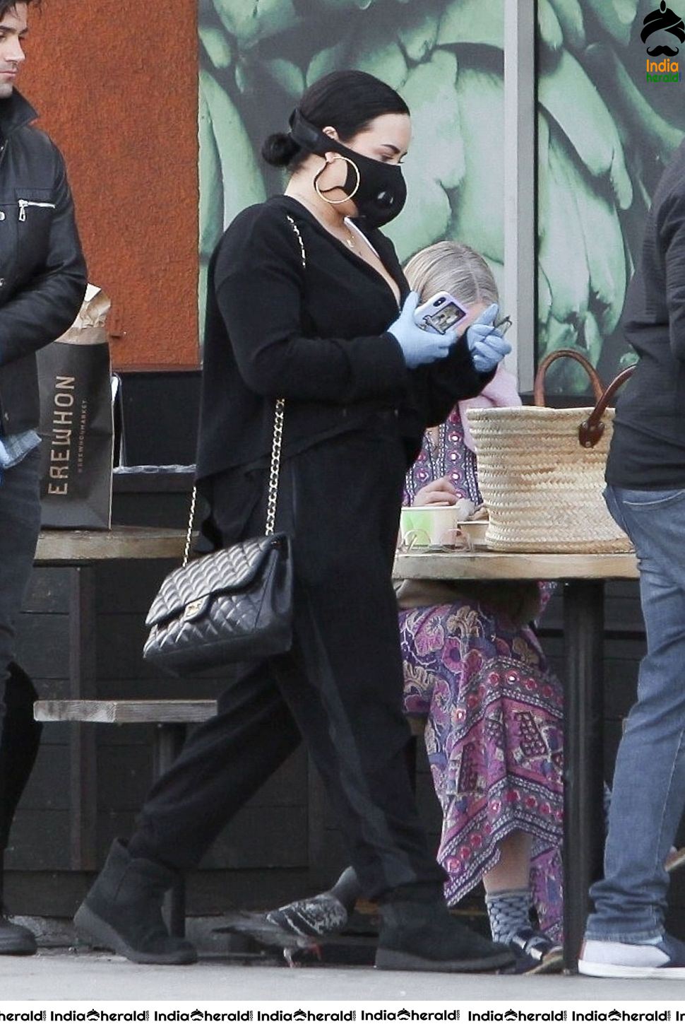 Demi Lovato Wears a Corona Virus mask as she shops at Erewhon in Los Angeles