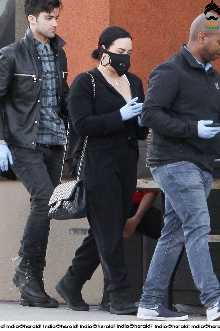 Demi Lovato Wears a Corona Virus mask as she shops at Erewhon in Los Angeles