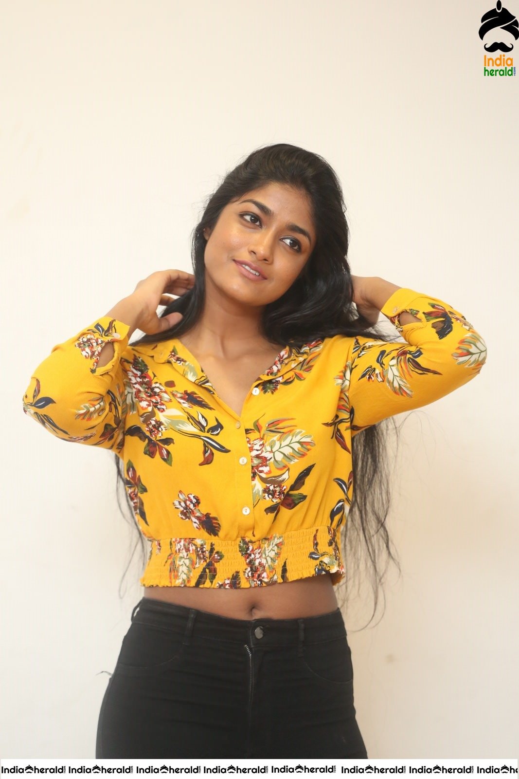 Dimple Hayathi Latest Hot Teasing Navel Photos in Top and Denim Bottom