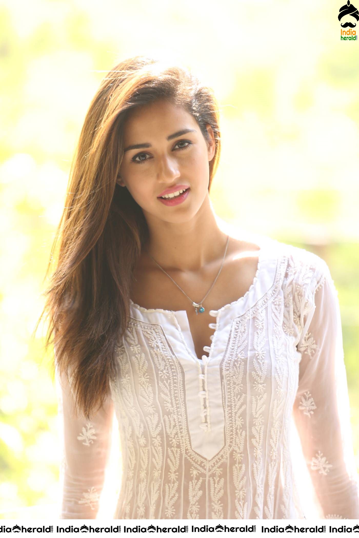 Disha Patani showing her Inner Beauty in Transparent White Dress