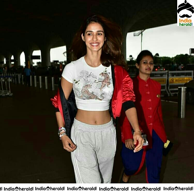 Disha Patani Showing Her Sext Waist Line And Navel In Tight T Shirt Spotted In mumbai Airport