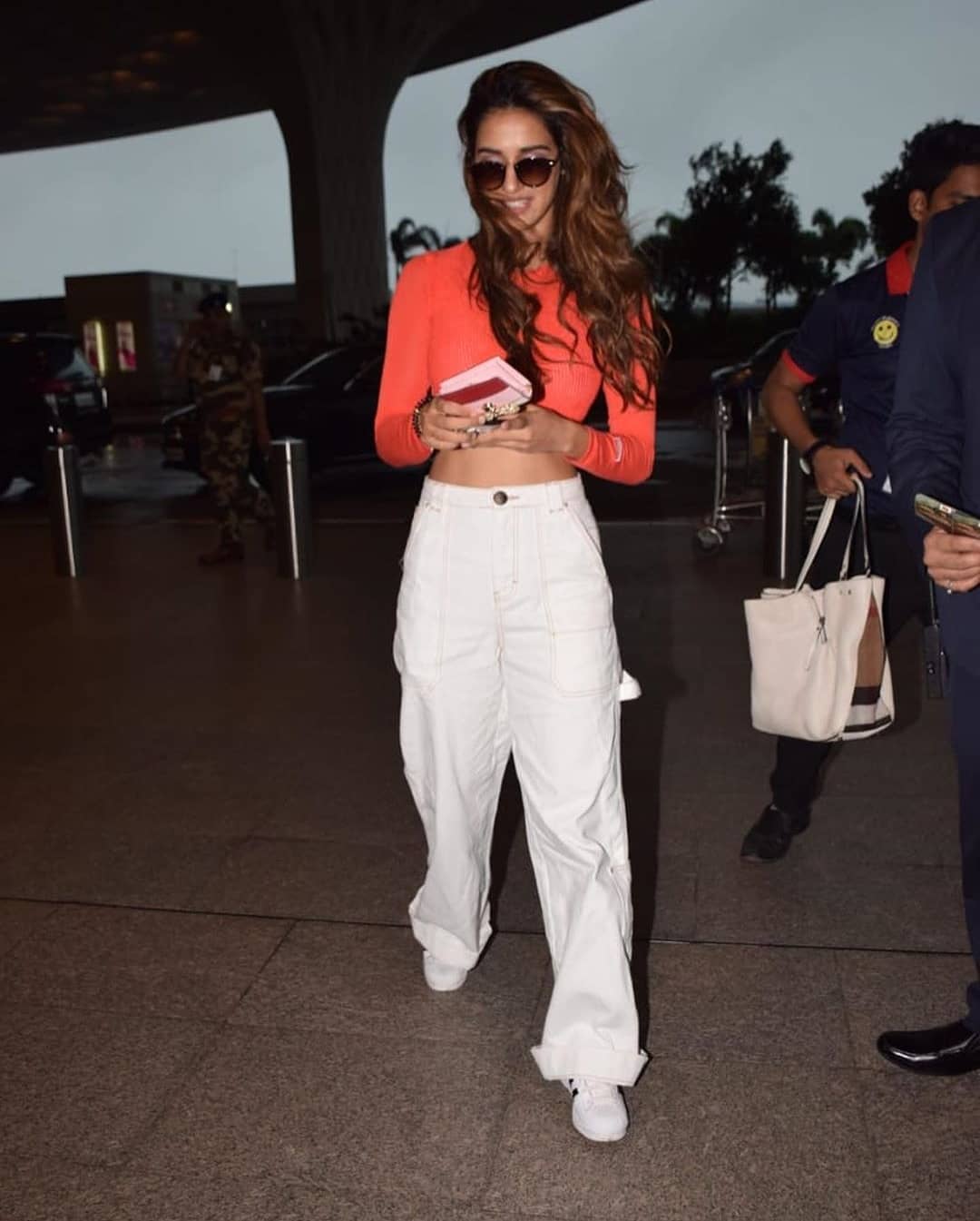 Disha Patani Shows Her Sexy Waist Line At Mumbai Airport
