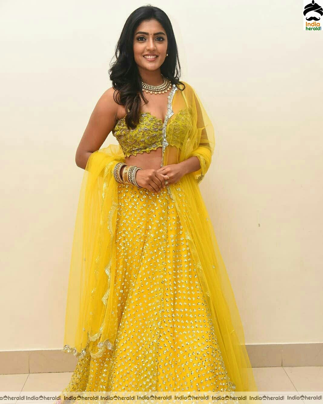 Eesha Rebba Shows Her Sexy Waistline In Yellow Dress Stills