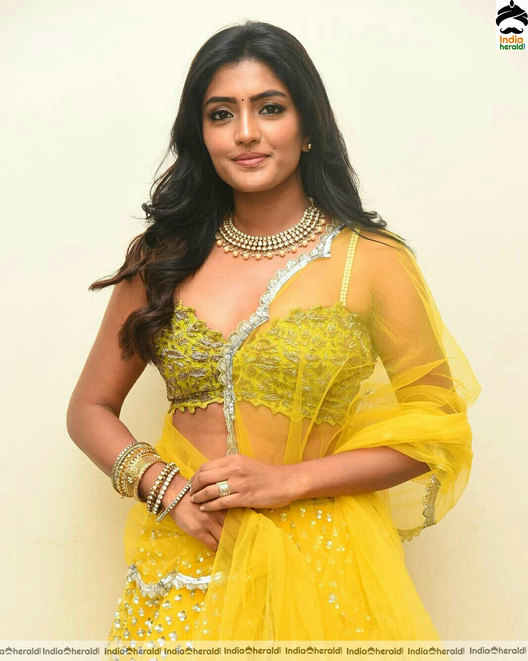 Eesha Rebba Shows Her Sexy Waistline In Yellow Dress Stills