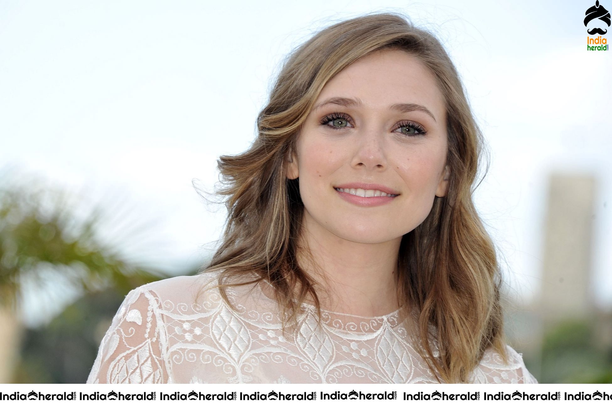 Elizabeth Olsen at Annual Cannes Festival Photocall