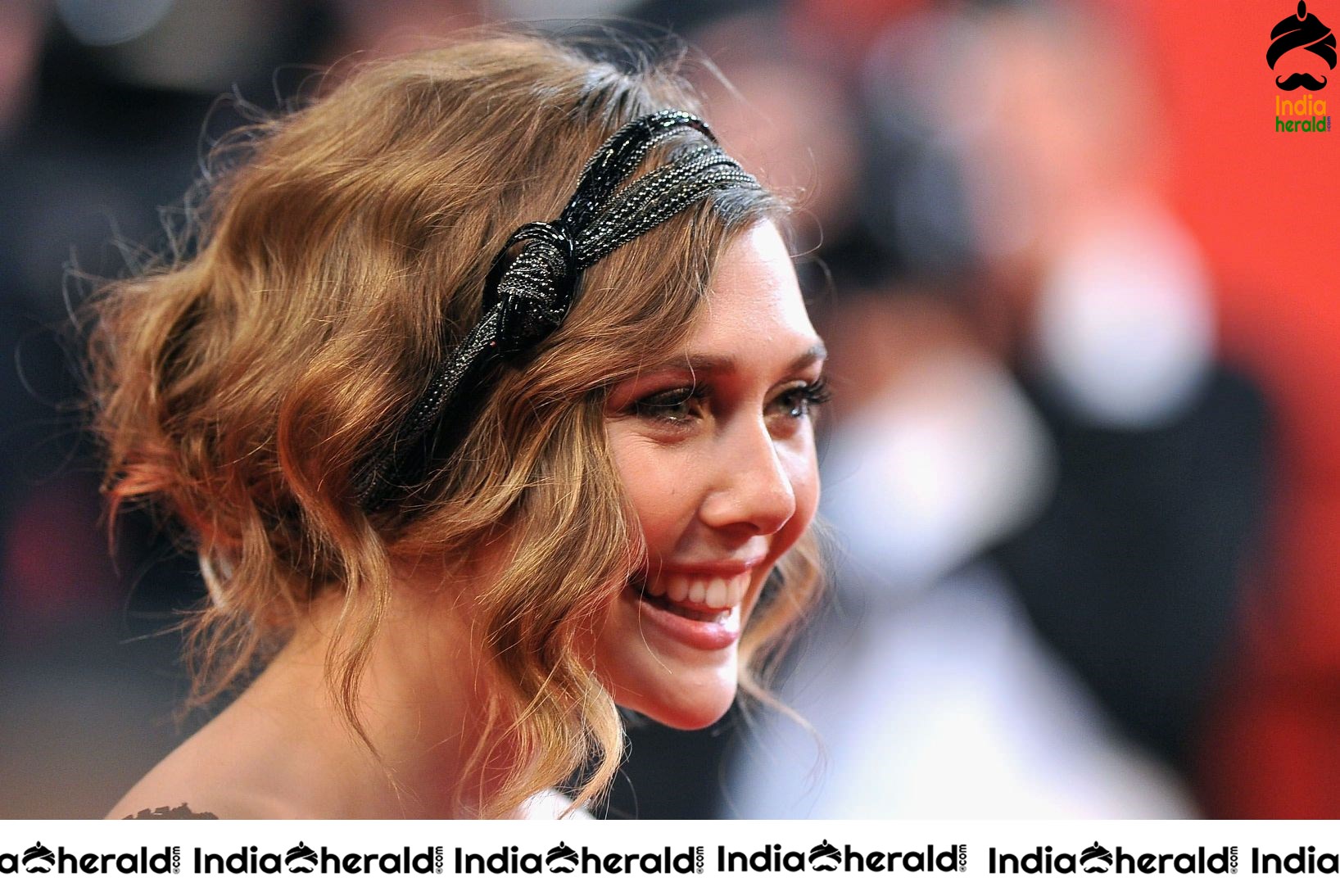 Elizabeth Olsen Looking Drop Dead Gorgeous in Black at Red Carpet