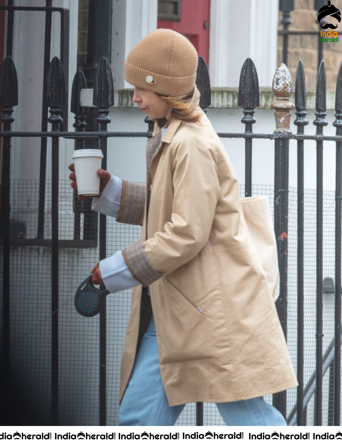 Emilia Clarke Takes her dog for a stroll as she steps out for a coffee in London