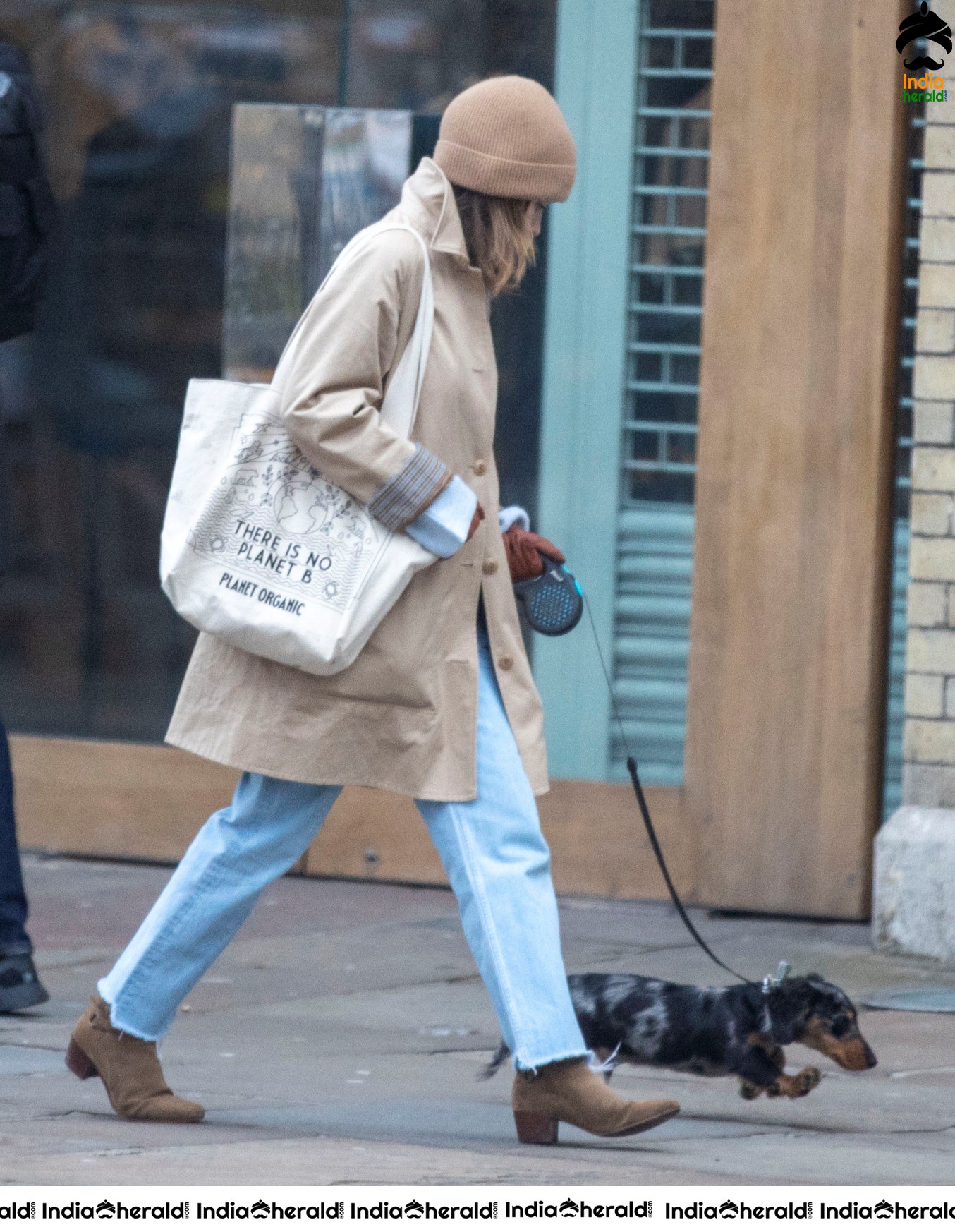 Emilia Clarke Takes her dog for a stroll as she steps out for a coffee in London