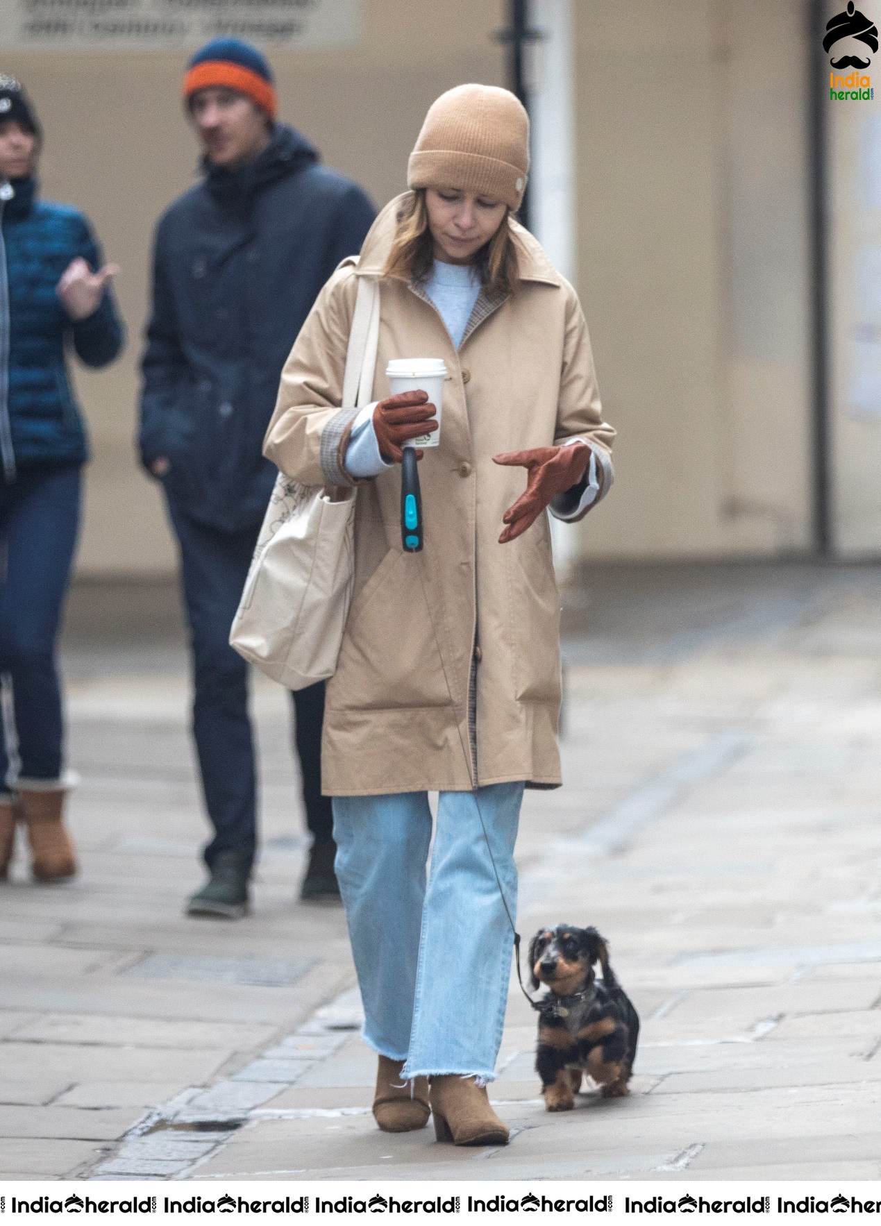 Emilia Clarke Takes her dog for a stroll as she steps out for a coffee in London