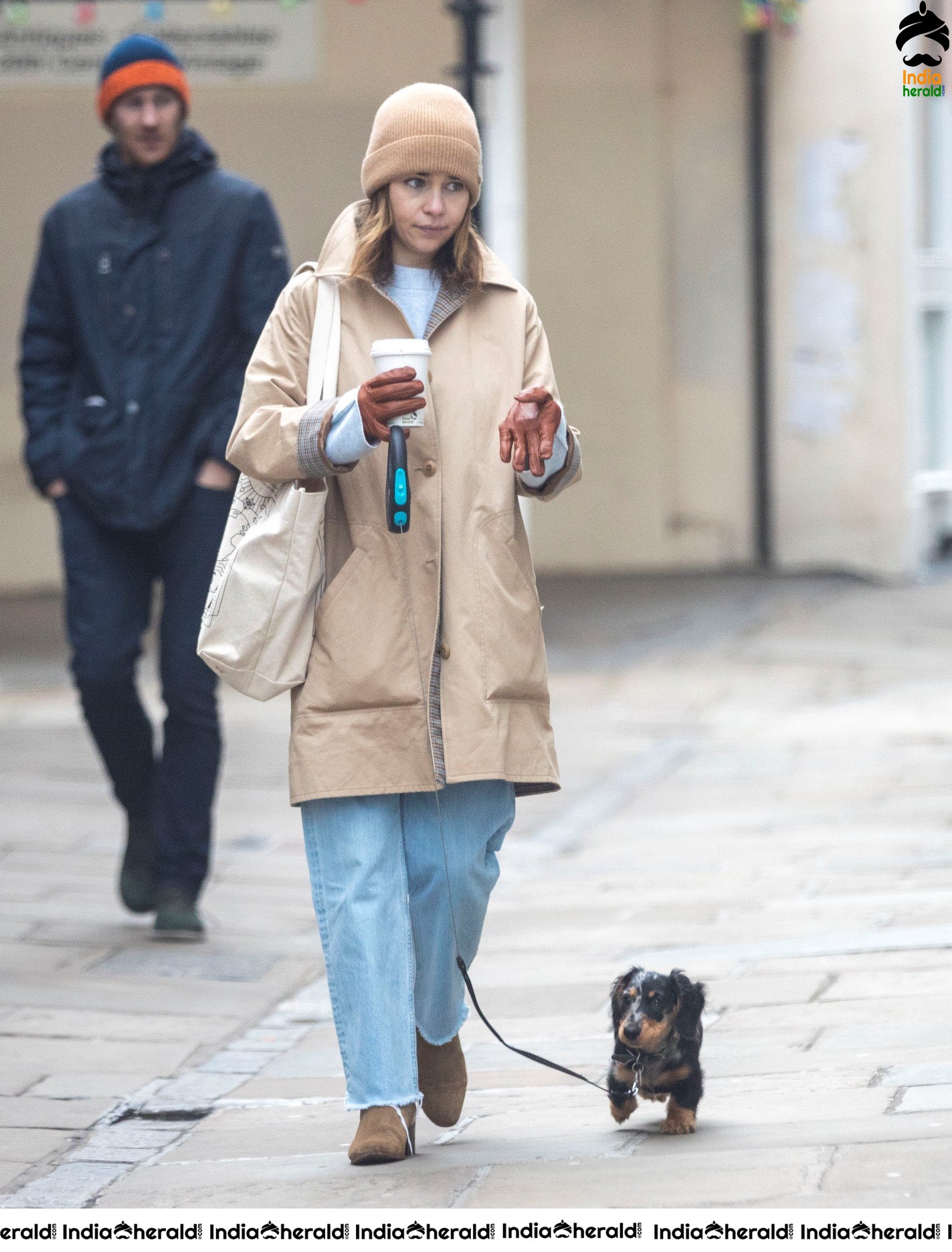 Emilia Clarke Takes her dog for a stroll as she steps out for a coffee in London