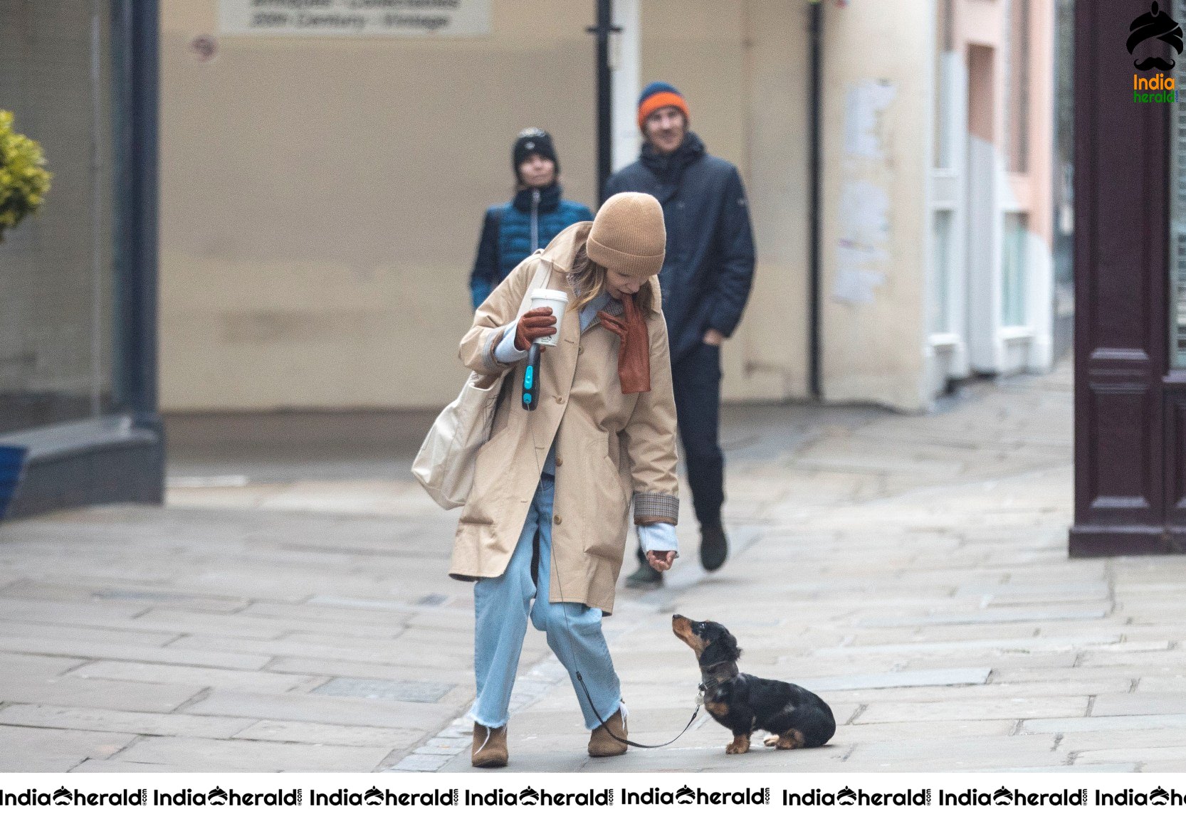 Emilia Clarke Takes her dog for a stroll as she steps out for a coffee in London