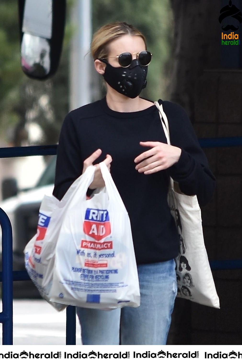 Emma Roberts wearing maks and seen outside Rite Aid in Los Feliz