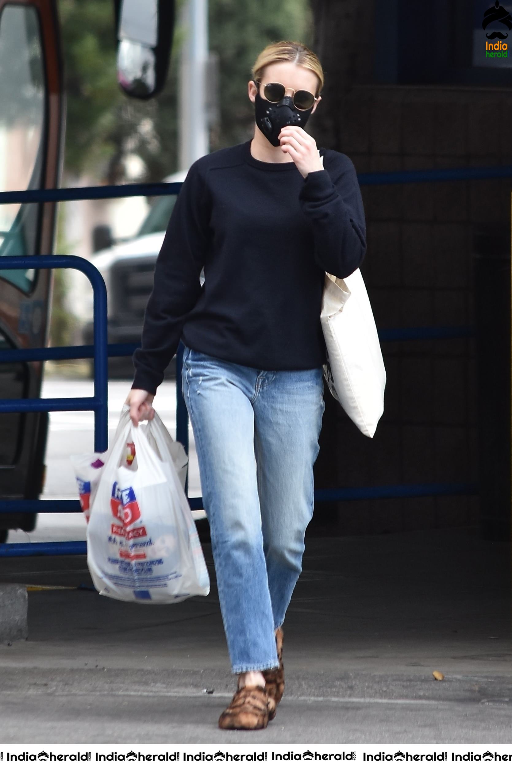 Emma Roberts wearing maks and seen outside Rite Aid in Los Feliz
