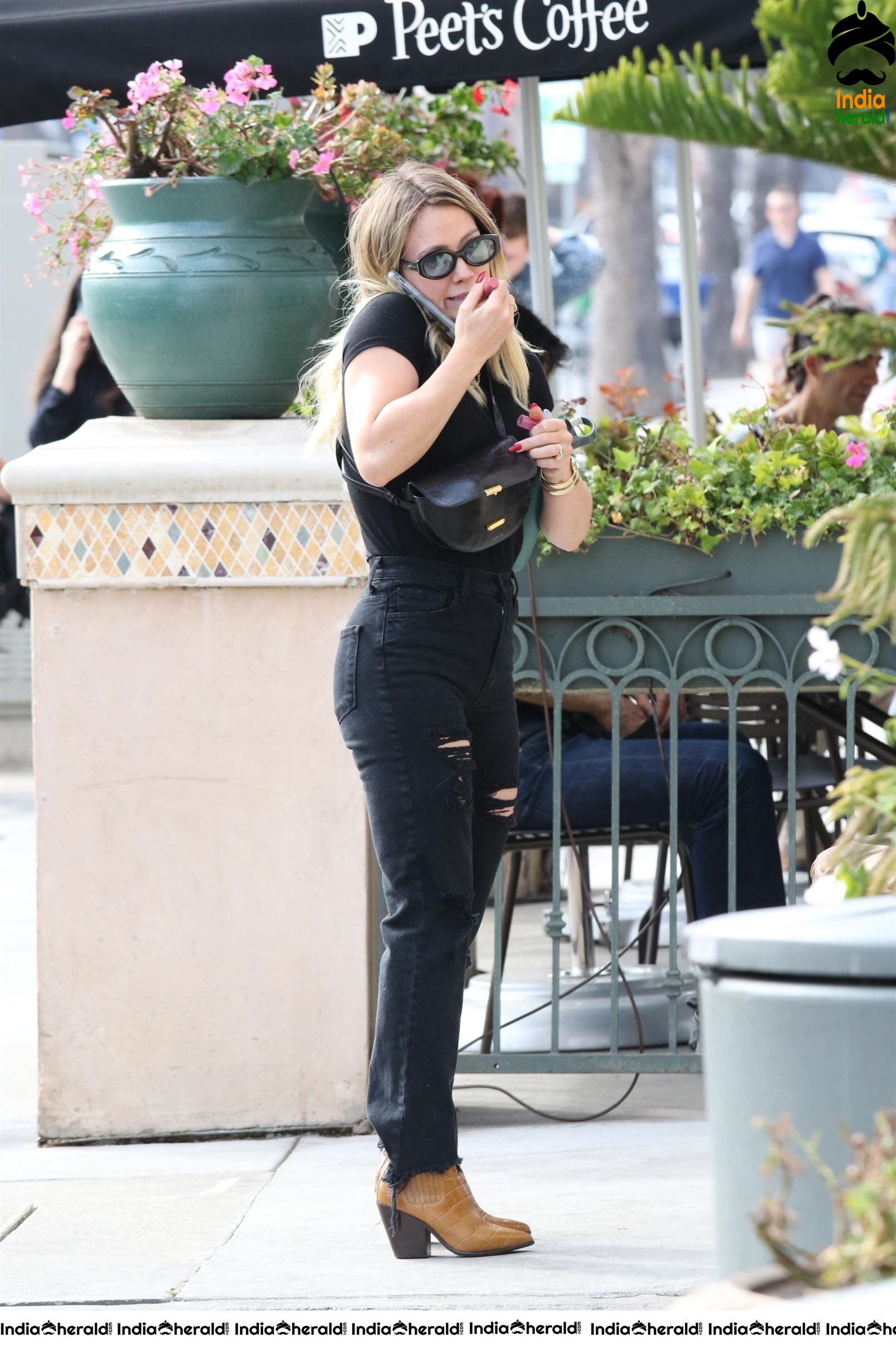 Hilary Duff spotted in Black attire while going to a meeting in Los Angeles