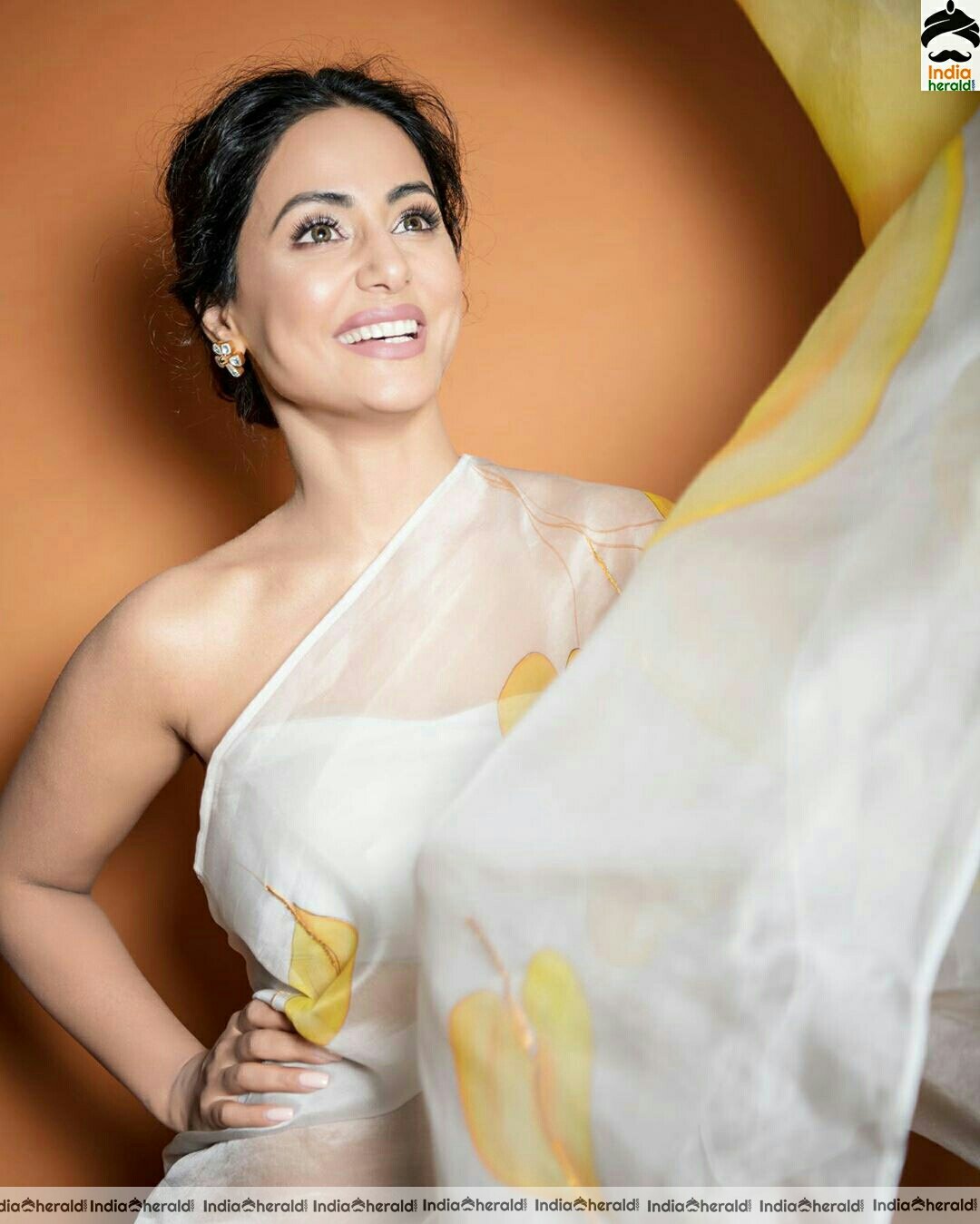 Hina khan Hot Tubeless Blouse and White Transparent Saree Stills