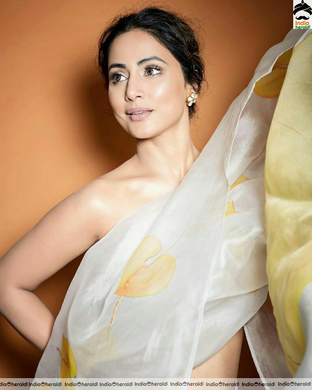 Hina khan Hot Tubeless Blouse and White Transparent Saree Stills