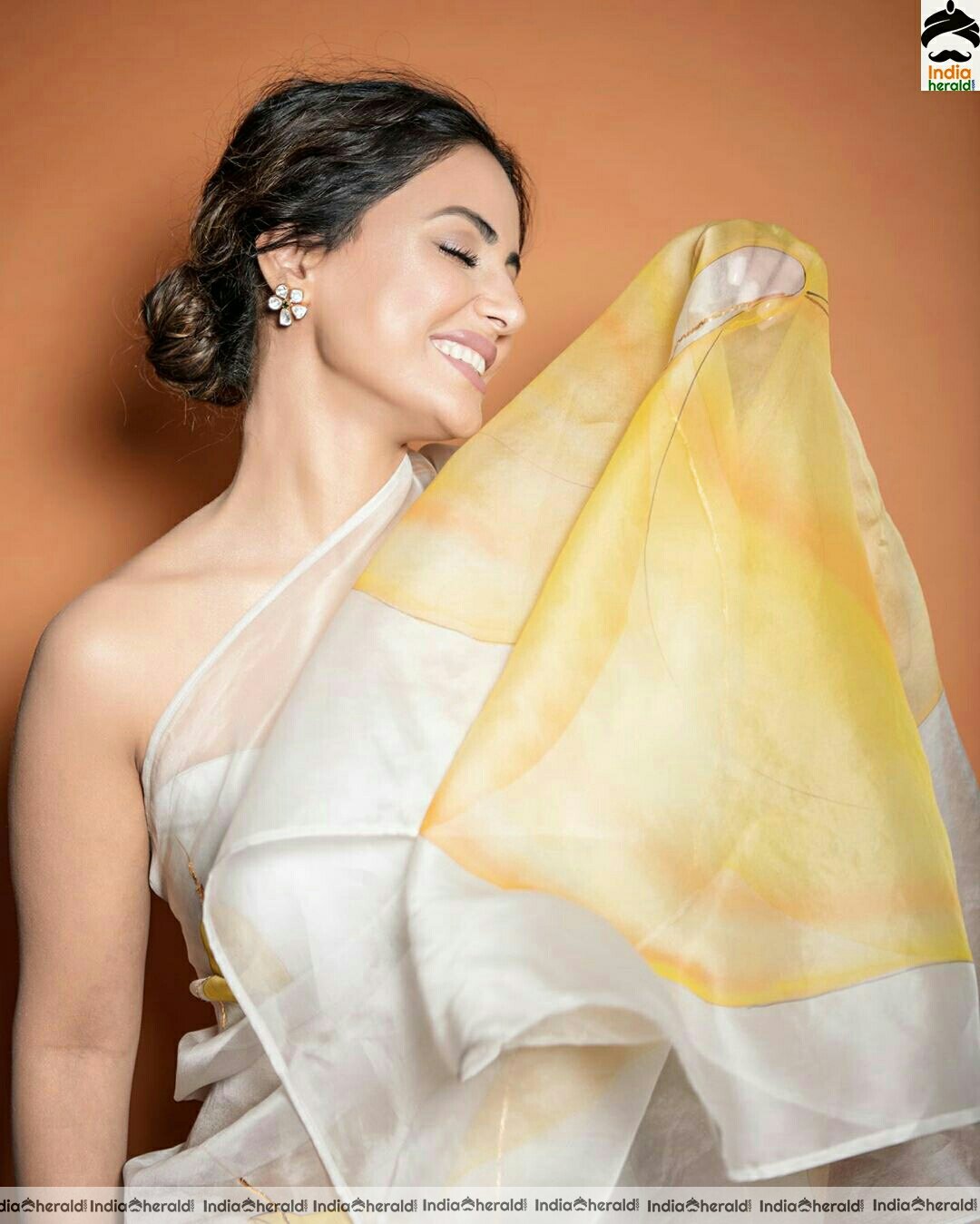 Hina khan Hot Tubeless Blouse and White Transparent Saree Stills