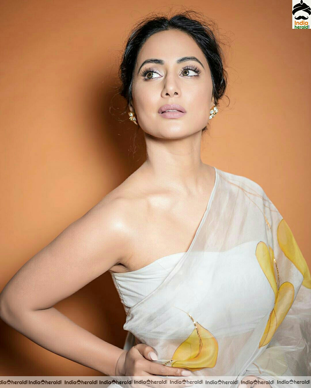 Hina khan Hot Tubeless Blouse and White Transparent Saree Stills