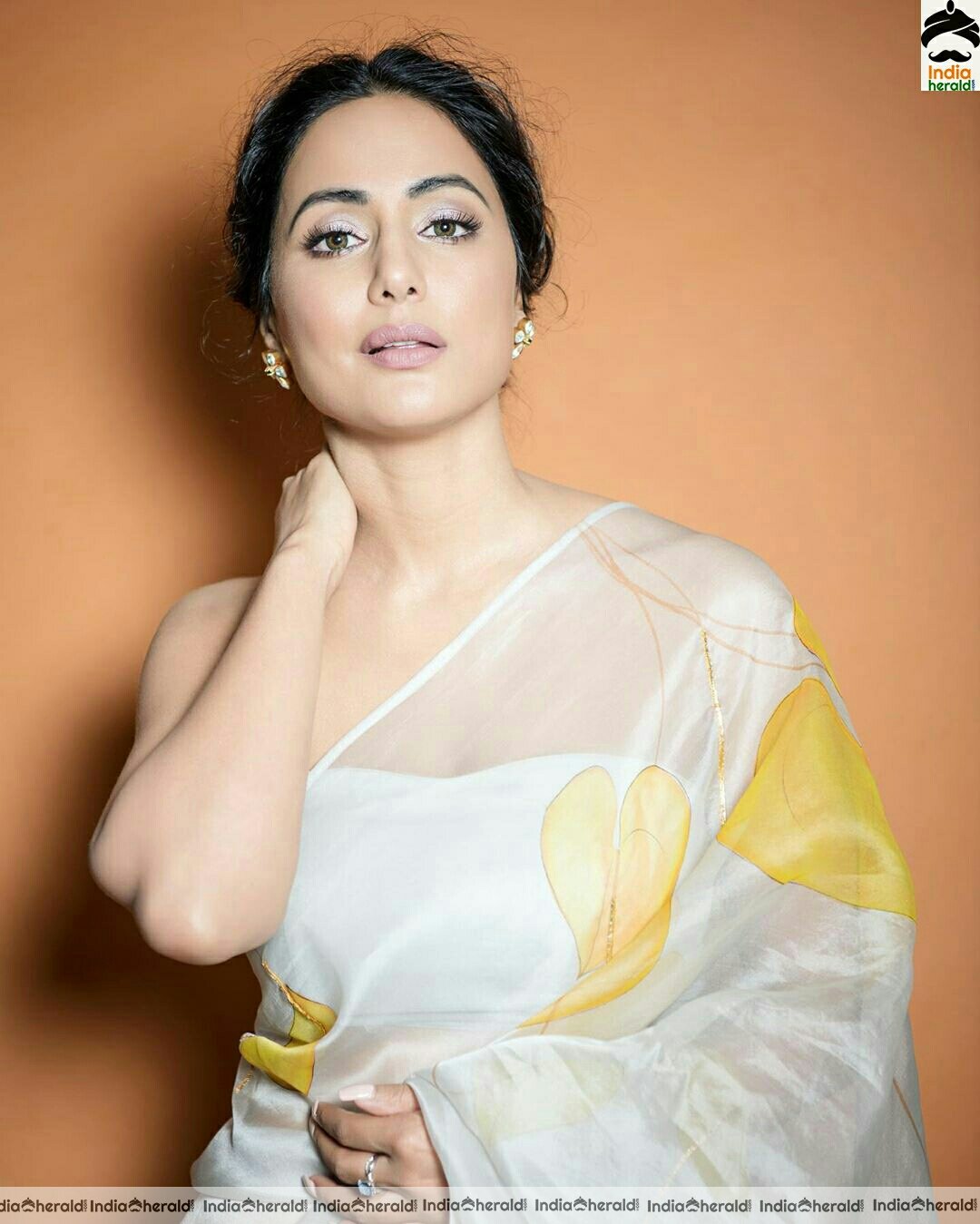 Hina khan Hot Tubeless Blouse and White Transparent Saree Stills