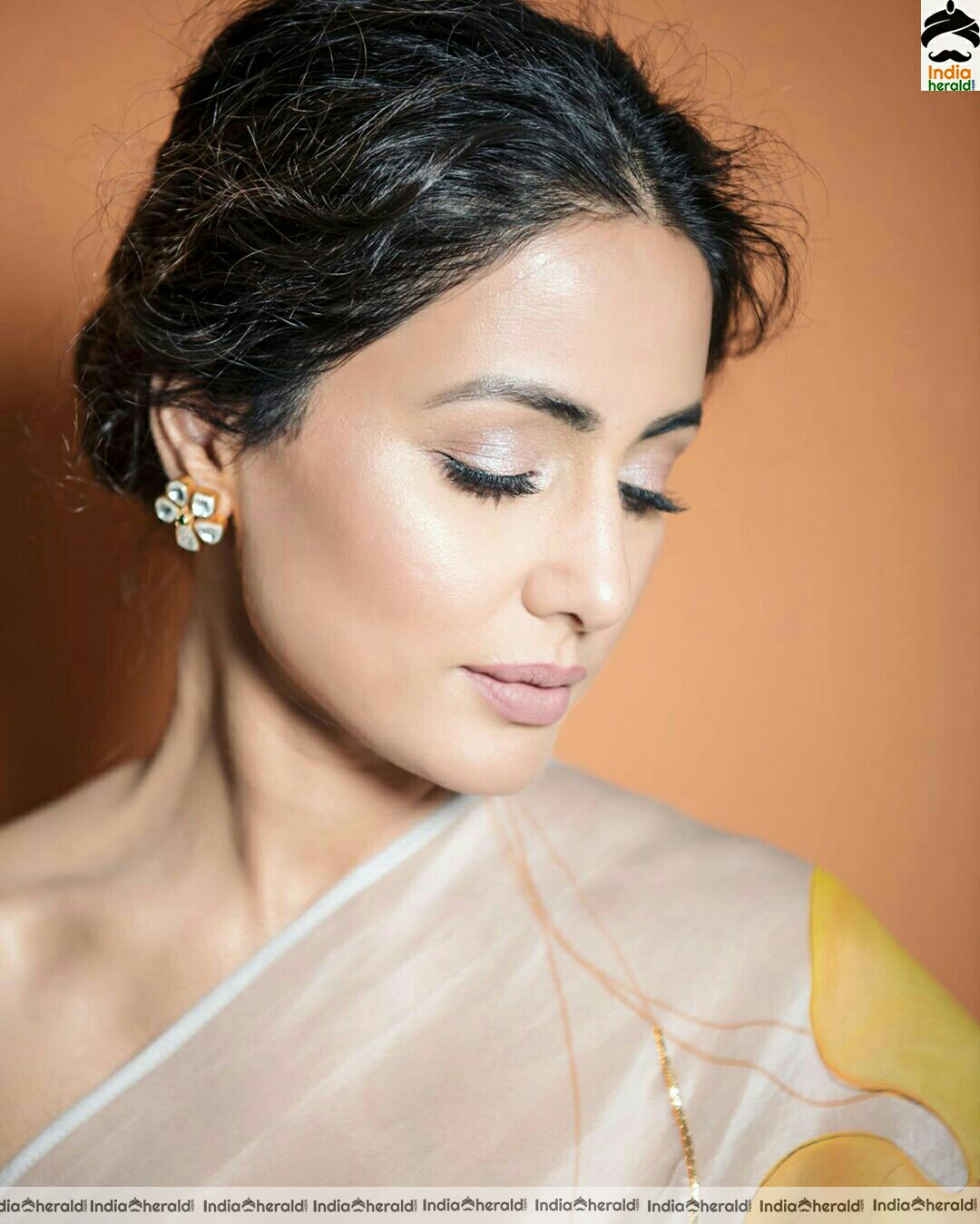 Hina khan Hot Tubeless Blouse and White Transparent Saree Stills