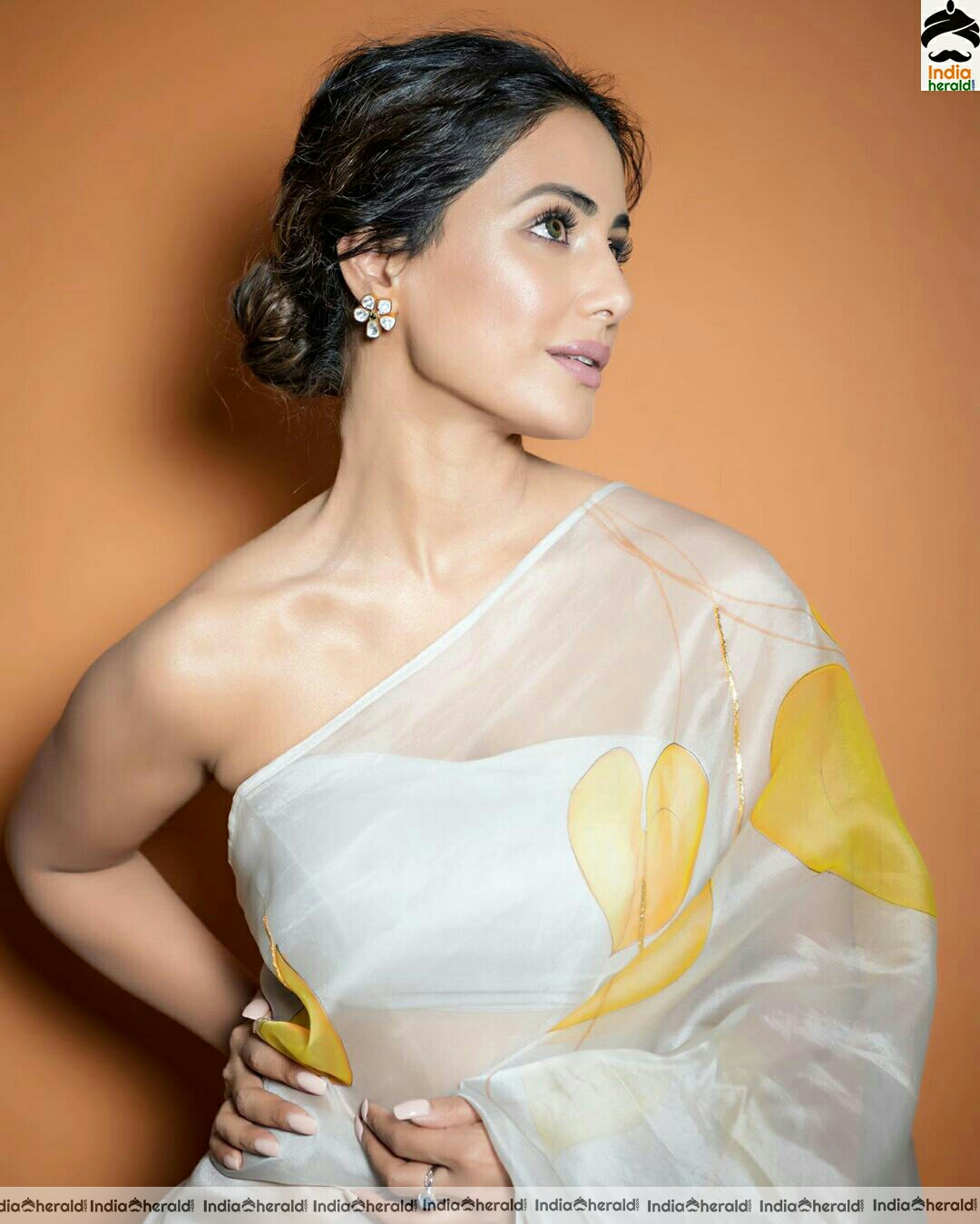 Hina khan Hot Tubeless Blouse and White Transparent Saree Stills