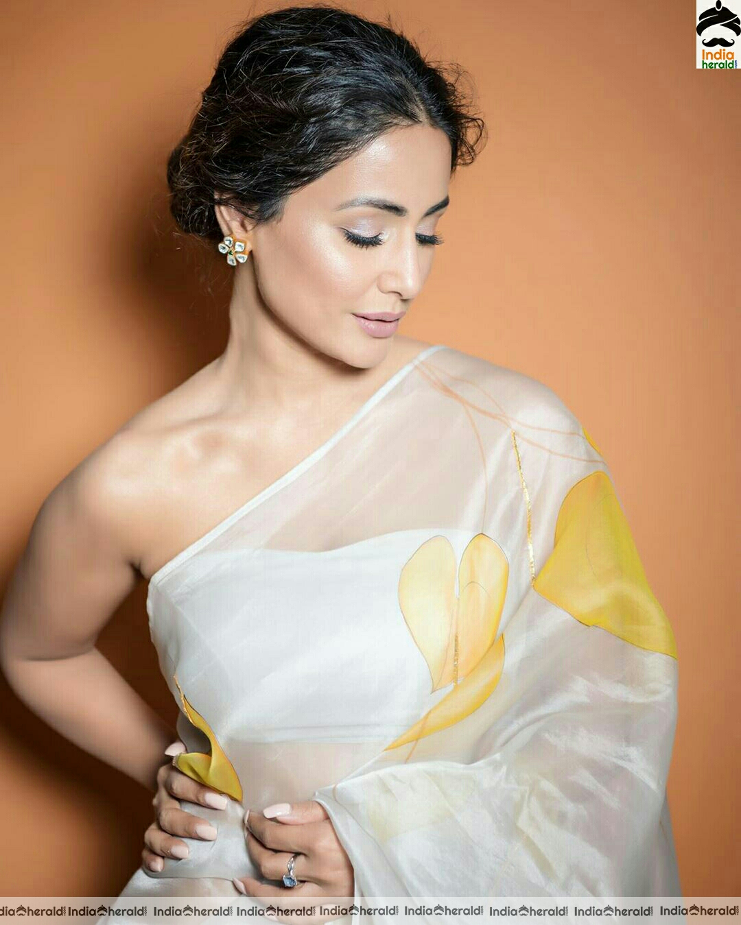 Hina khan Hot Tubeless Blouse and White Transparent Saree Stills