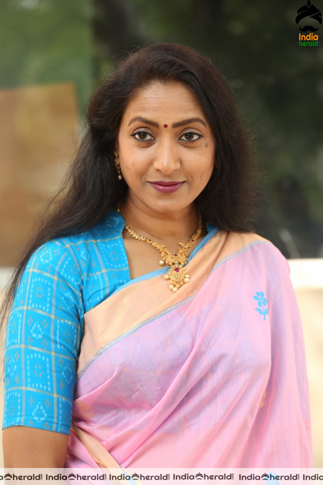 Hot Middle Aged Actress in Pink Saree at Ammadeevena Press Meet Set 1