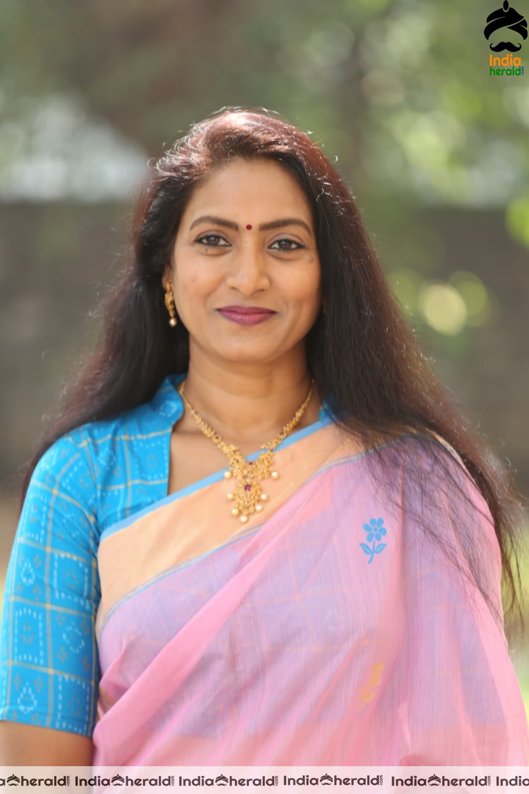 Hot Middle Aged Actress in Pink Saree at Ammadeevena Press Meet Set 2