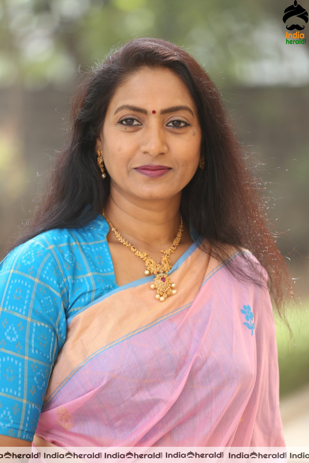 Hot Middle Aged Actress in Pink Saree at Ammadeevena Press Meet Set 2