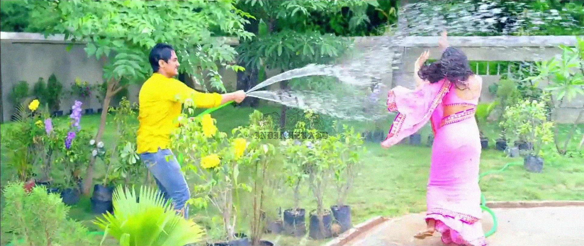 Hottest Photos of Trisha getting Wet and stripping her Saree Set 1