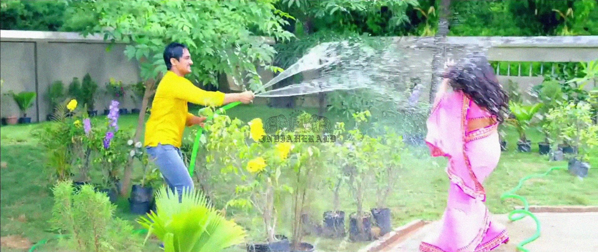 Hottest Photos of Trisha getting Wet and stripping her Saree Set 1