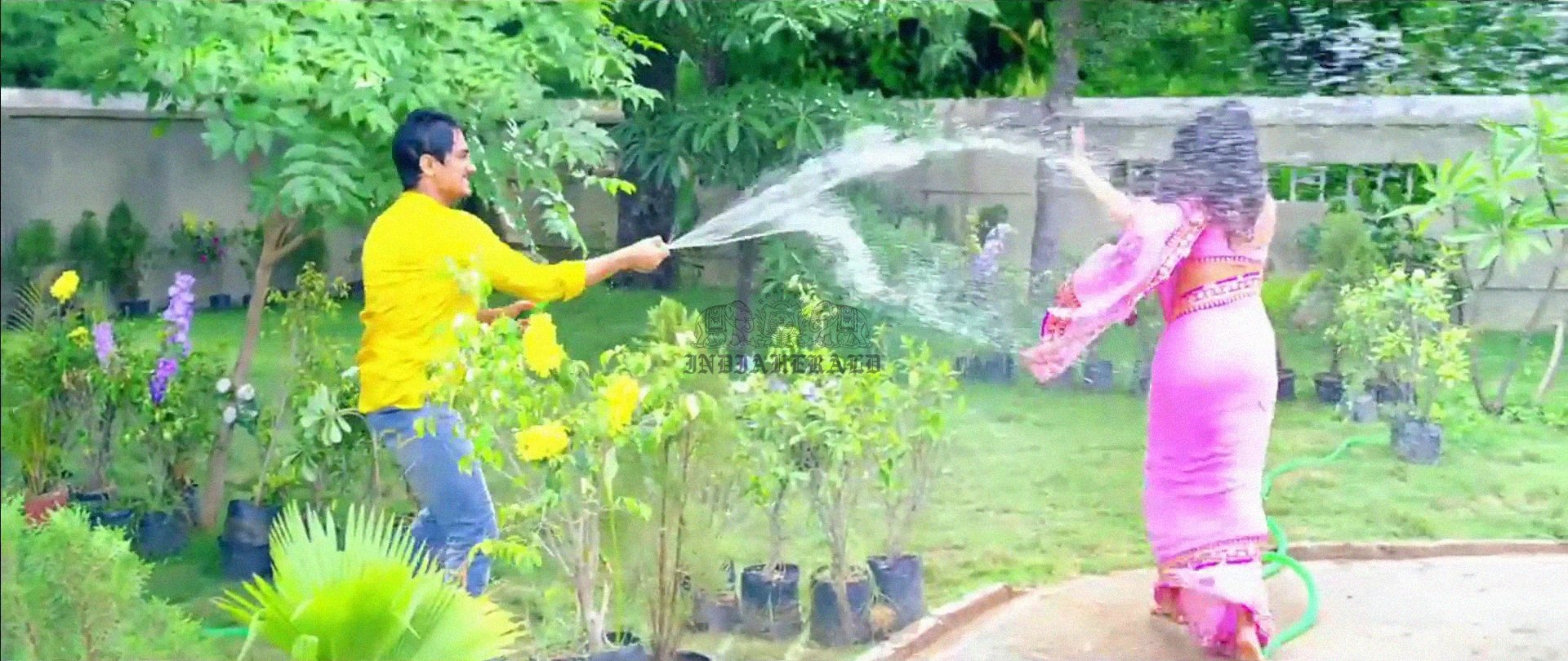 Hottest Photos of Trisha getting Wet and stripping her Saree Set 1